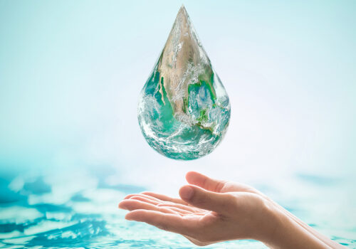 Female woman human hands on blurred wavy clean water background: Female woman human hands on blurred wavy clean water background: